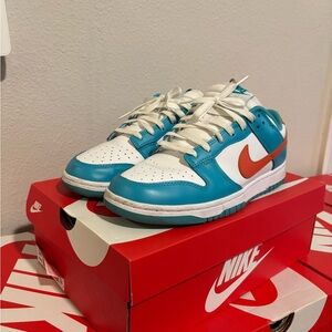 Nike White and Blue Sneakers with Orange Swoosh